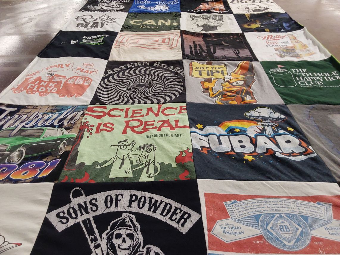 T-shirt quilt with music, science themes by Emily from MA