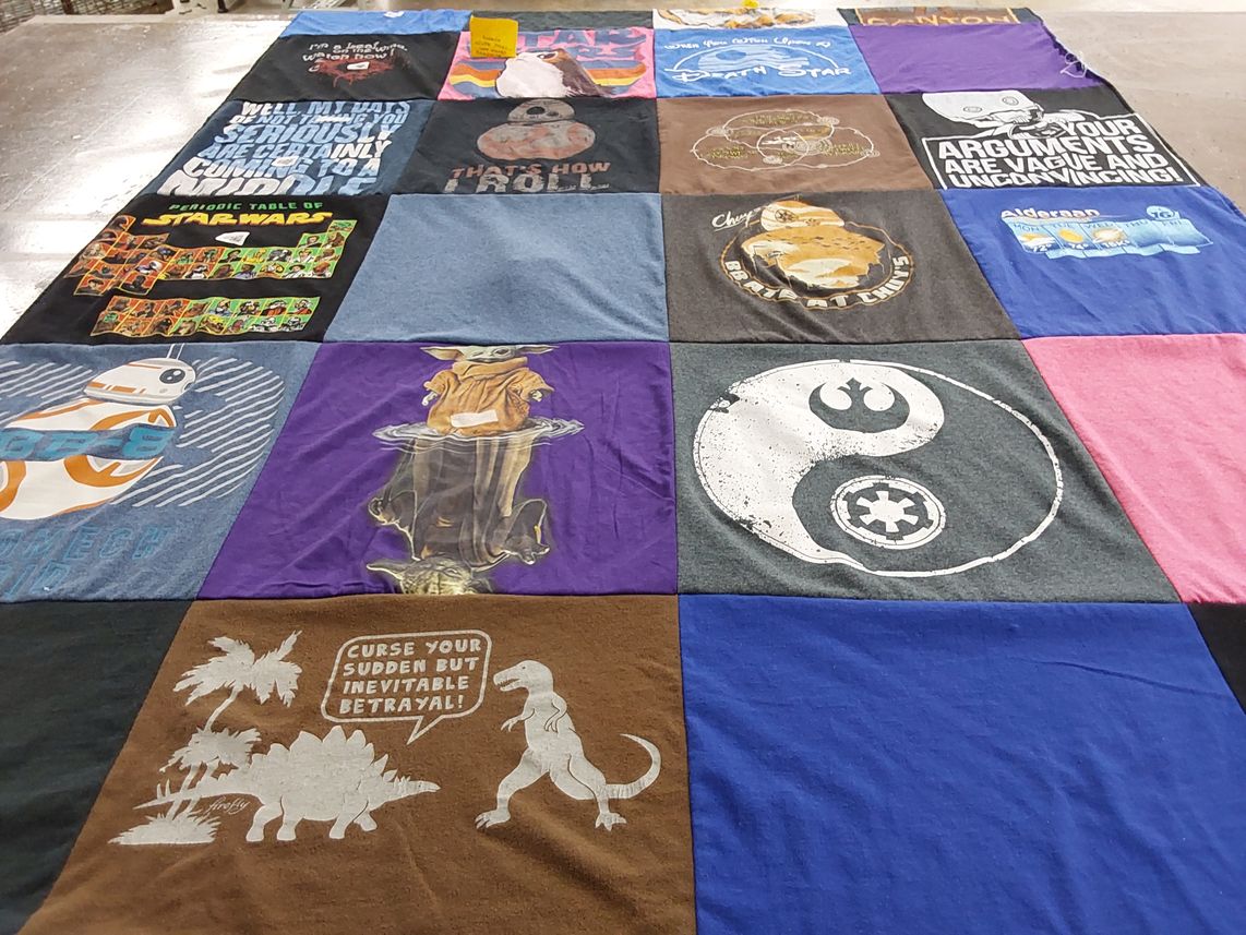 T-shirt quilt with star wars, fantasy themes by Christina from TX