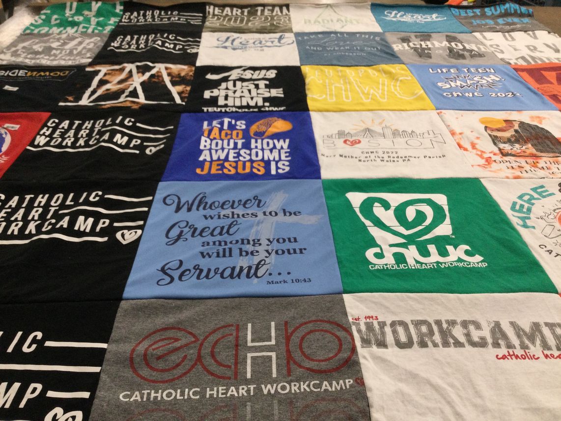 T-shirt quilt with volunteering, religion themes by Macy from IL