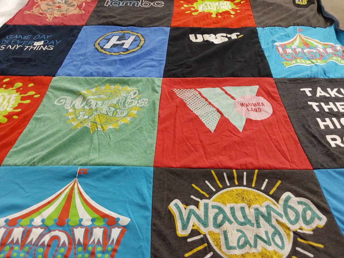 T-shirt quilt with amusement parks, fun themes by Amy from GA