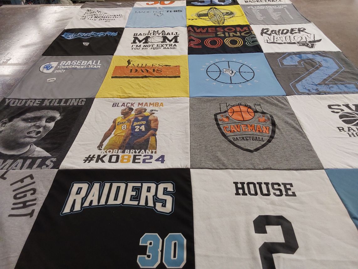 T-shirt quilt featuring seneca valley raiders, caveman basketball by Emily from PA