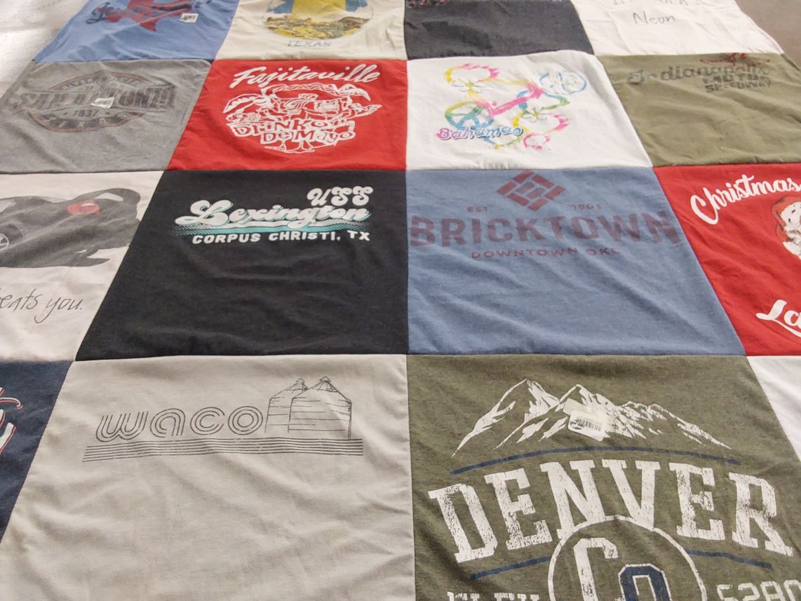 T-shirt quilt with travel, history themes by Kari from TX