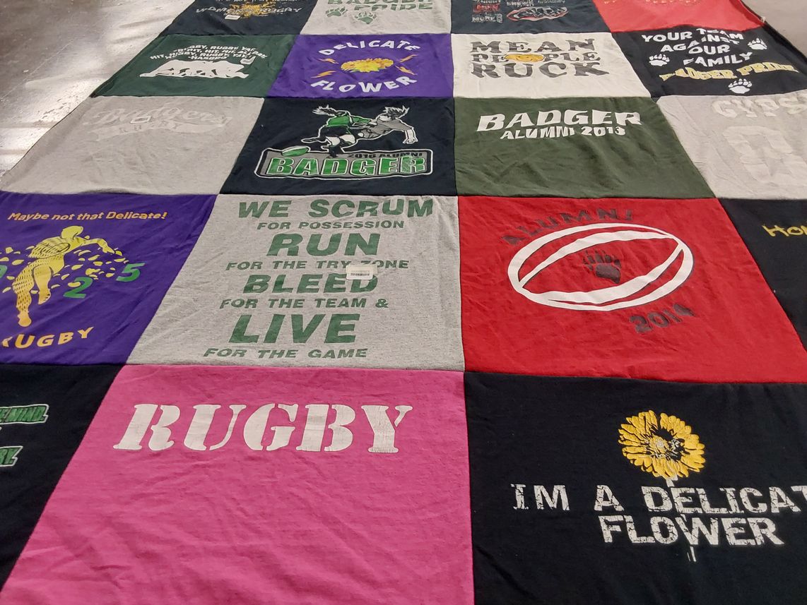 T-shirt quilt with rugby, sports themes by Krystal from NV