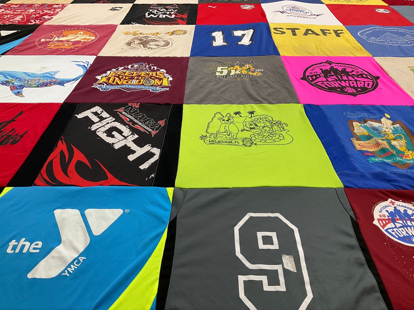 T-shirt quilt with community service, outdoor activities themes by Renee from FL