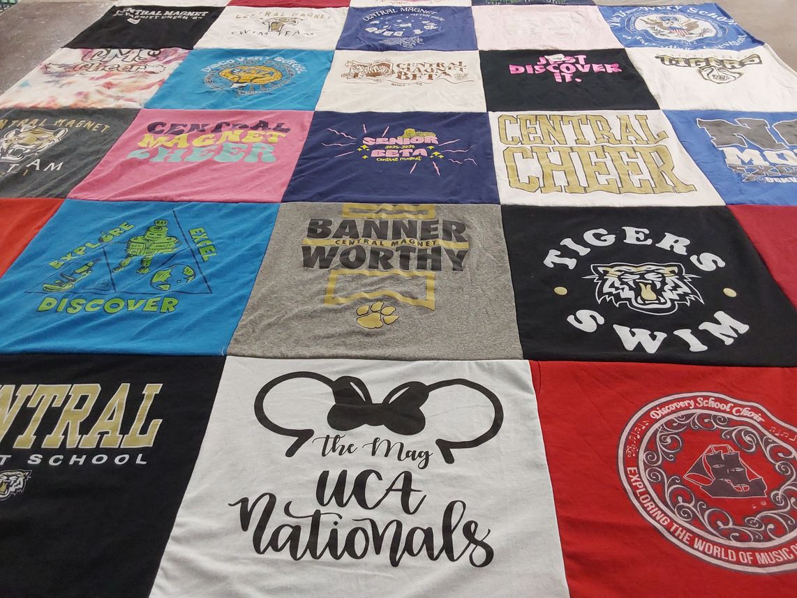 T-shirt quilt featuring central magnet cheer team, tigers swim team by Claudia V from TN