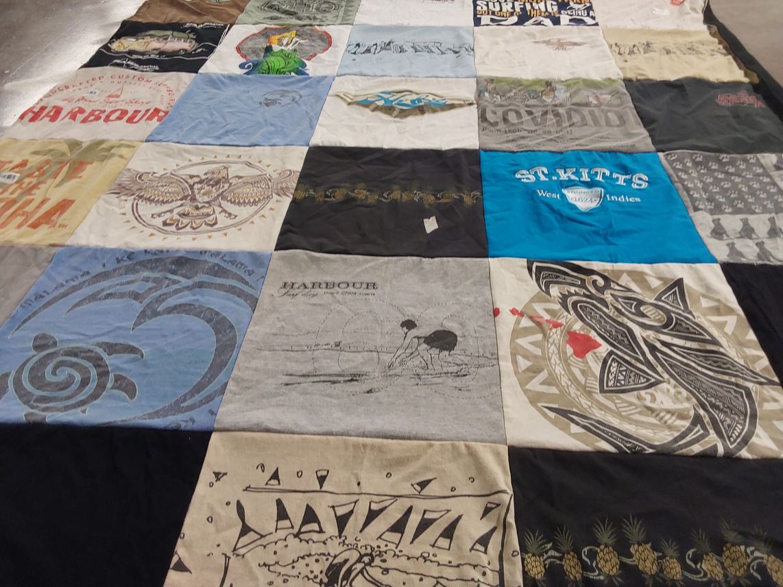 T-shirt quilt with surfing, island culture themes by Clifford from NC