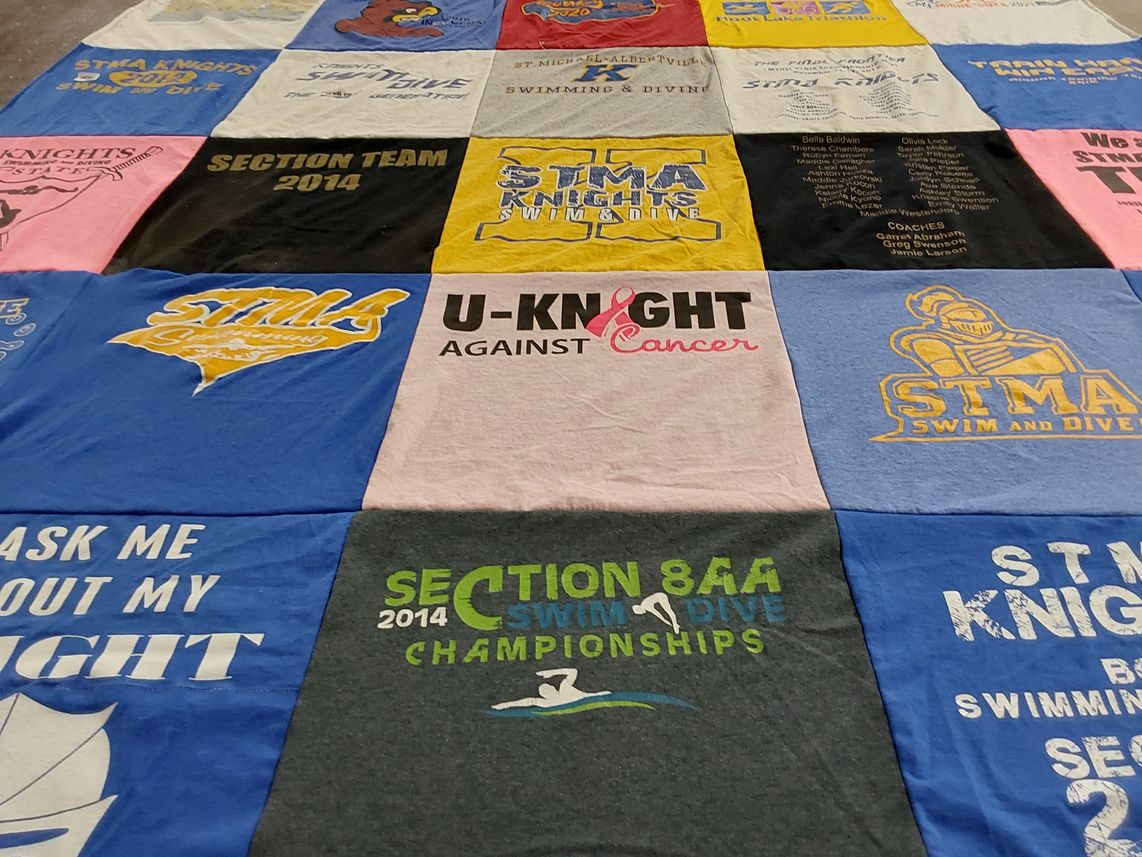 T-shirt quilt featuring st. michael-albertville high school swim and dive by Jamie from MN
