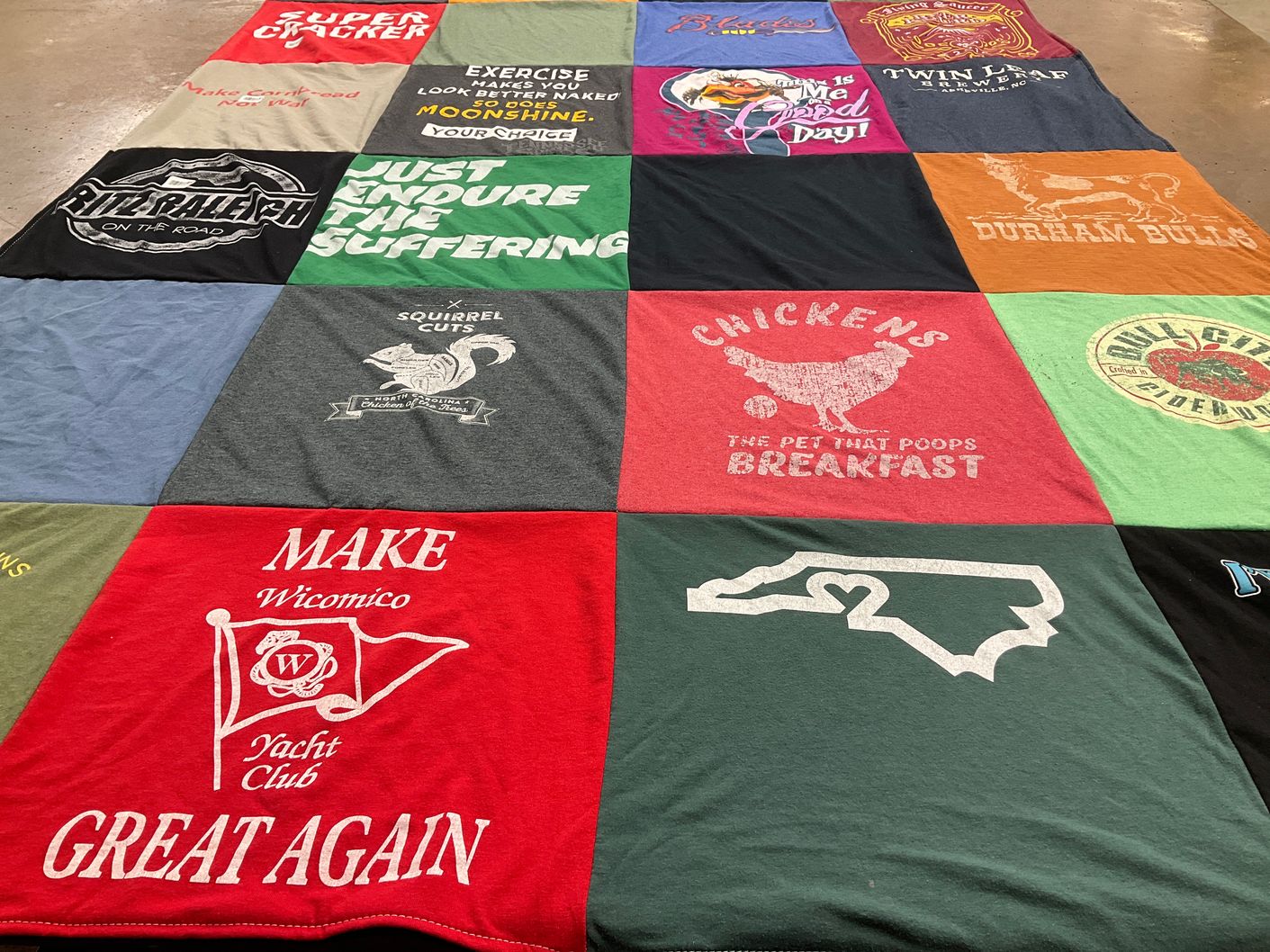 T-shirt quilt with sports, outdoors themes by Kerry from NC