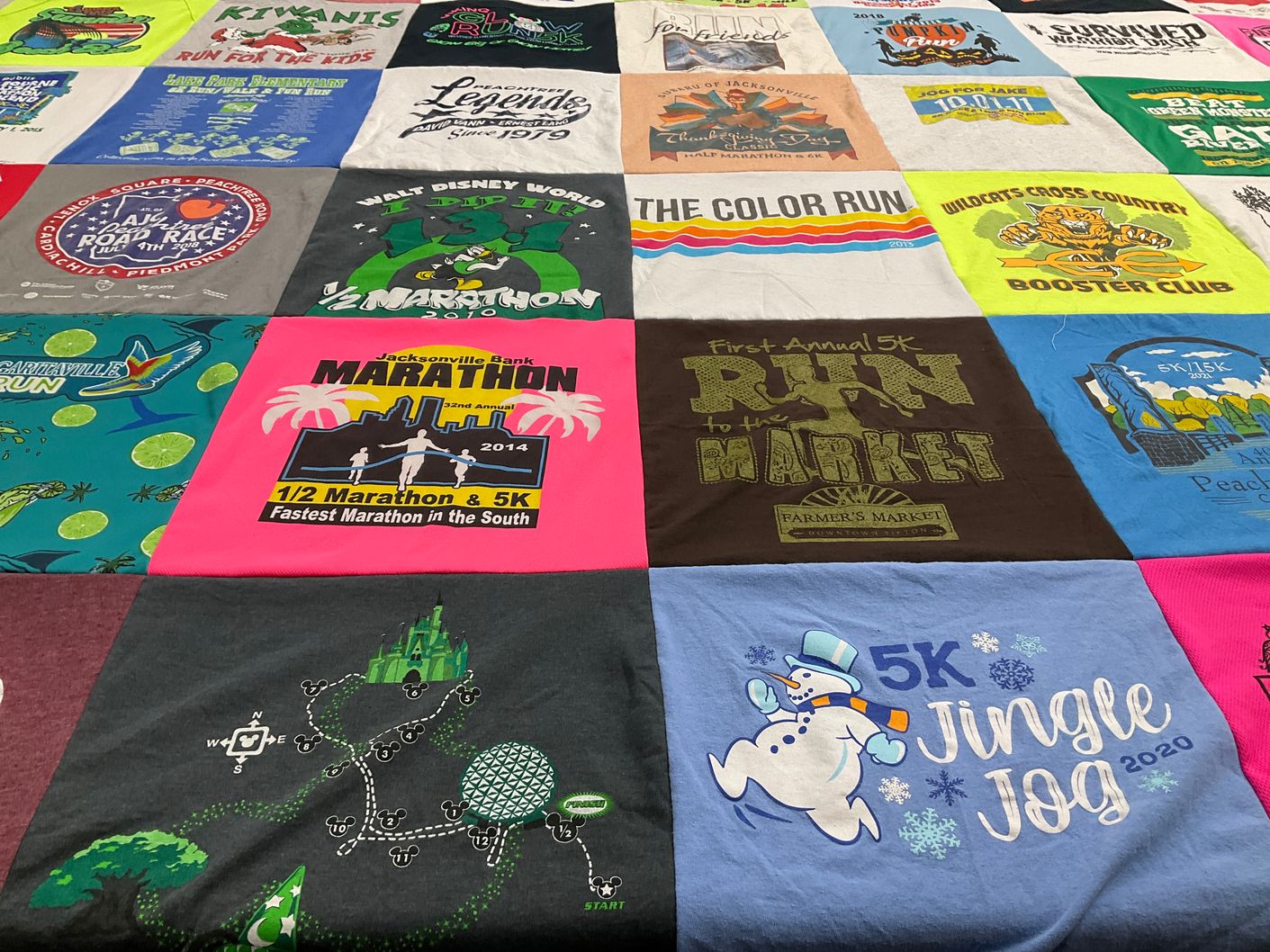 T-shirt quilt with running, charity themes by Sandy from GA