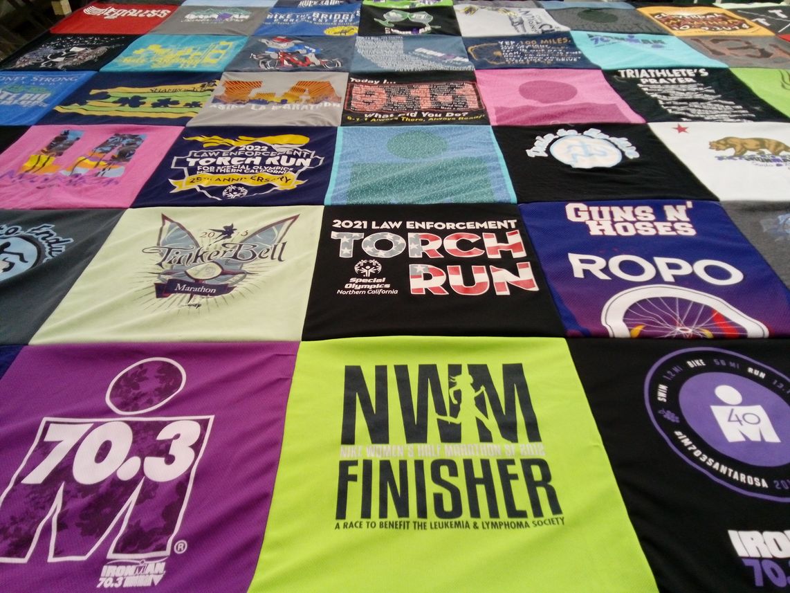 T-shirt quilt with running, marathons themes by Linda from CA