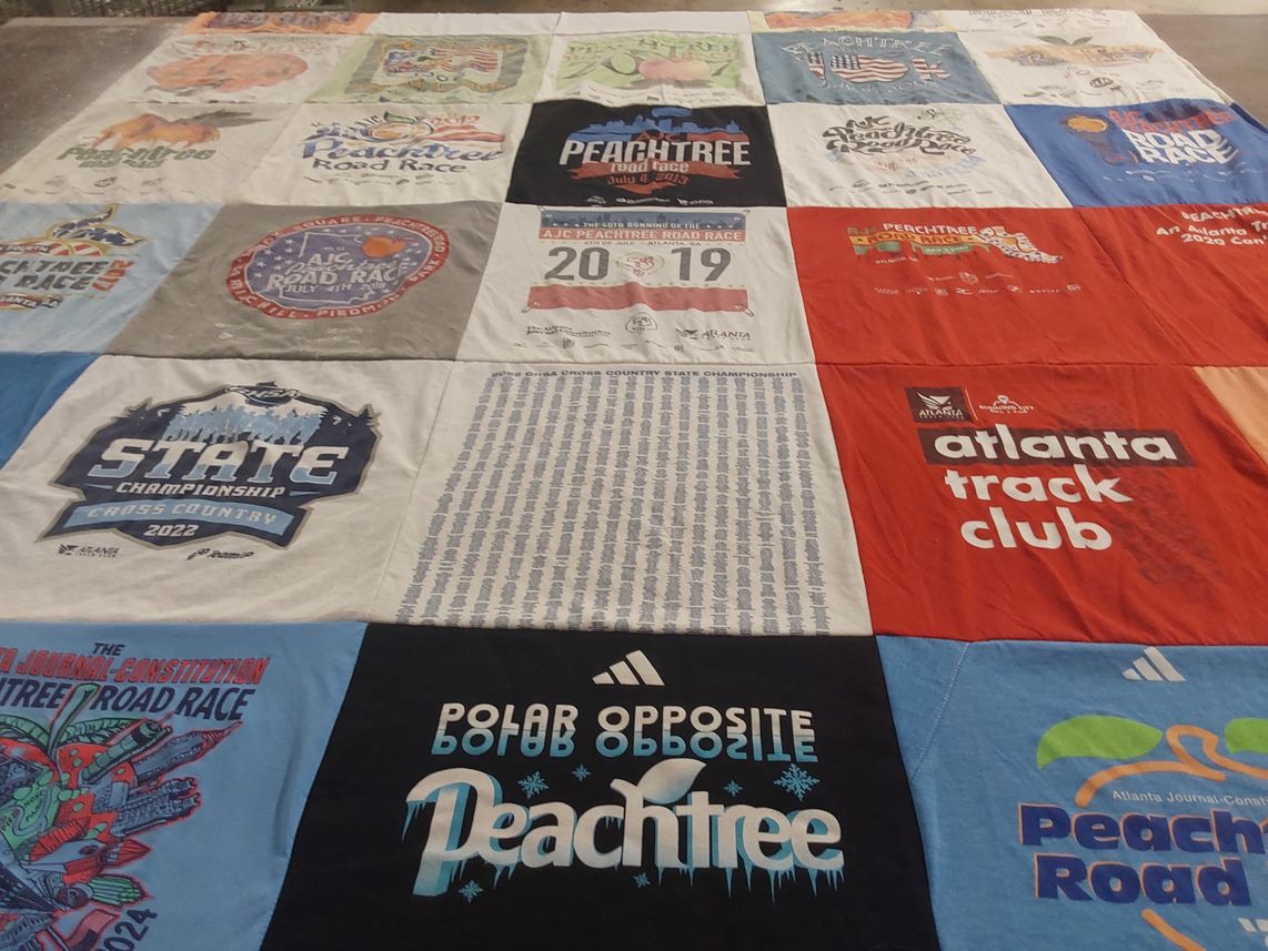 T-shirt quilt with running, athletics themes by Lesley from GA