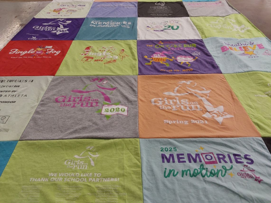 T-shirt quilt with running, sports themes by Marguerite from FL