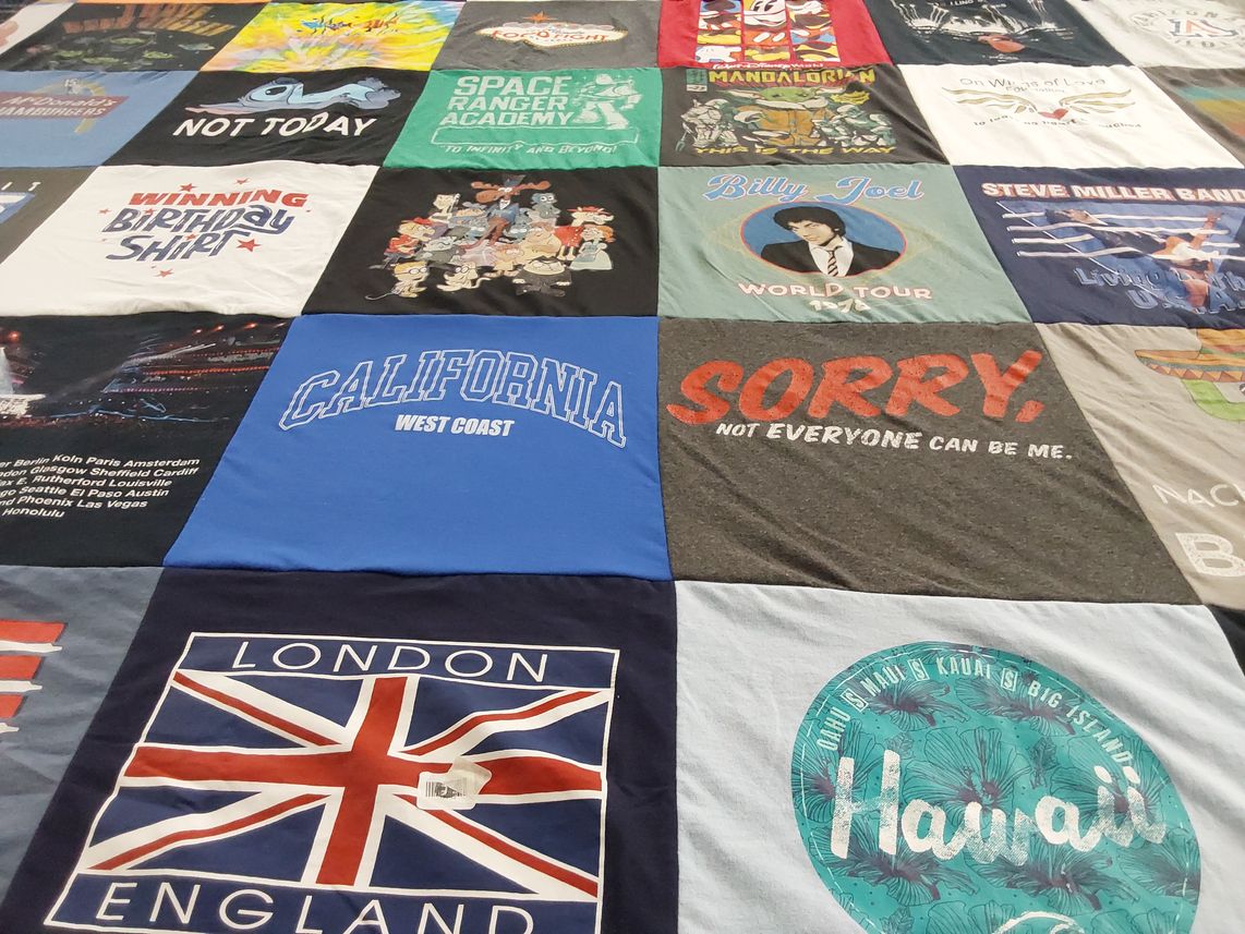 T-shirt quilt with music, travel themes by Brian from AZ