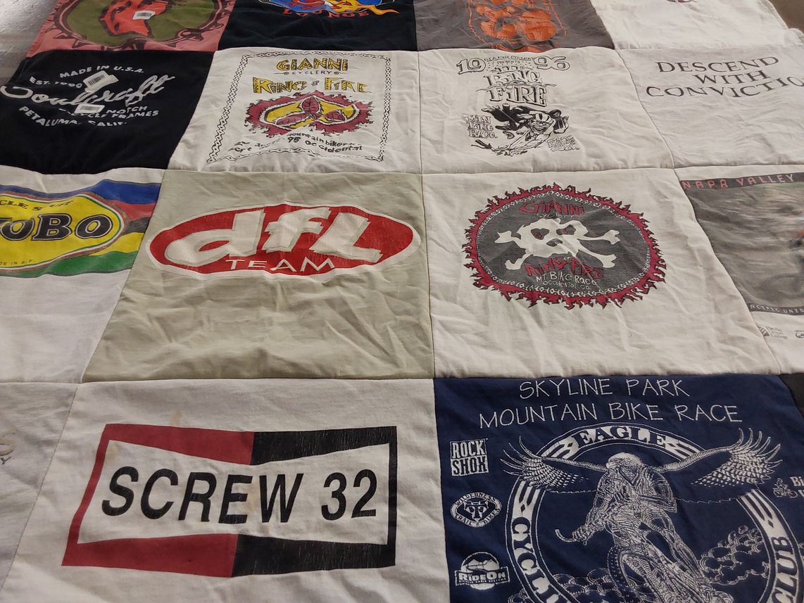 T-shirt quilt with mountain biking, cycling themes by Coby from CA