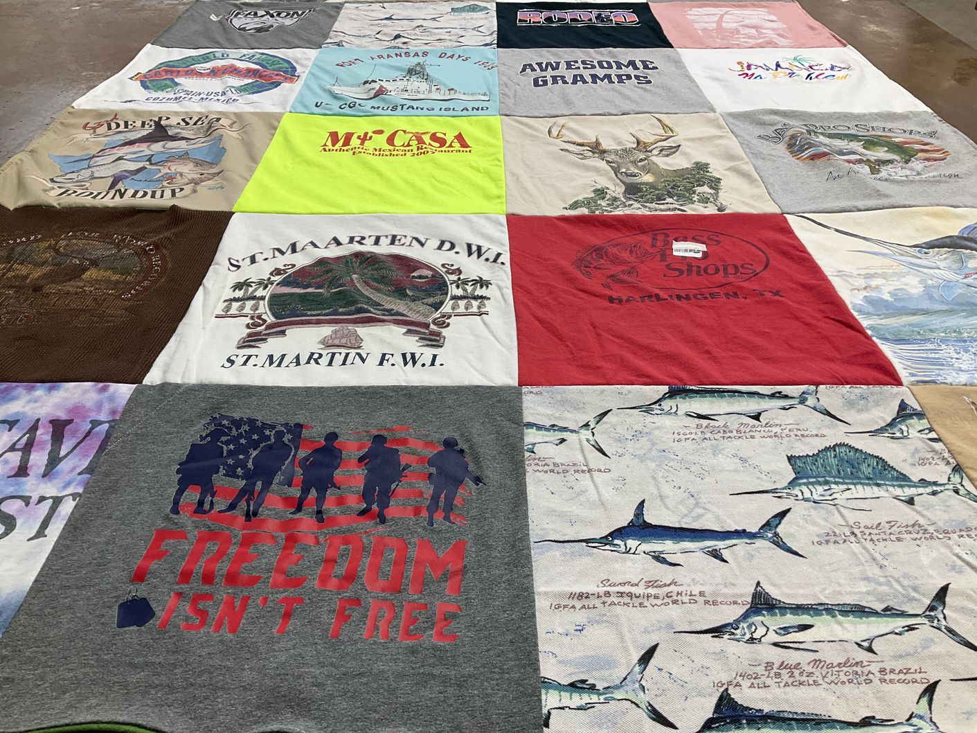 T-shirt quilt with fishing, hunting themes by Carolyn from TX