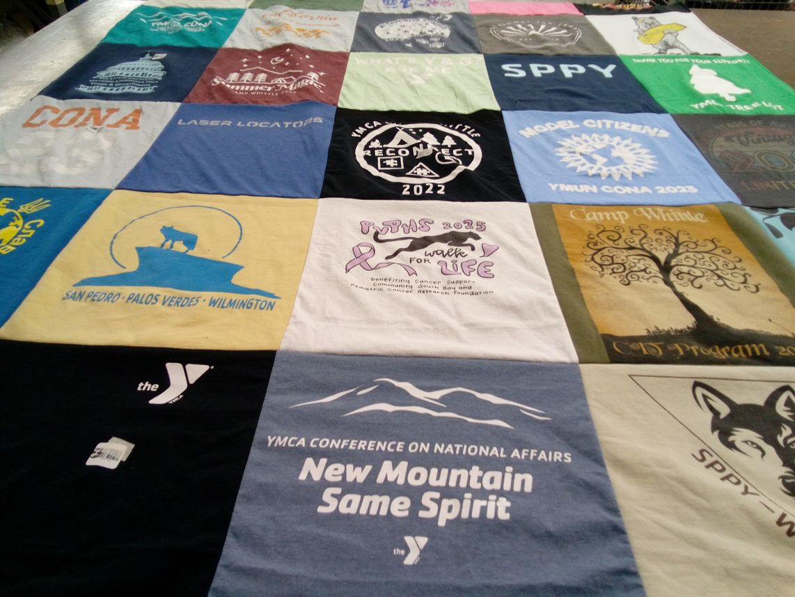 T-shirt quilt with camping, community service themes by Macha from CA