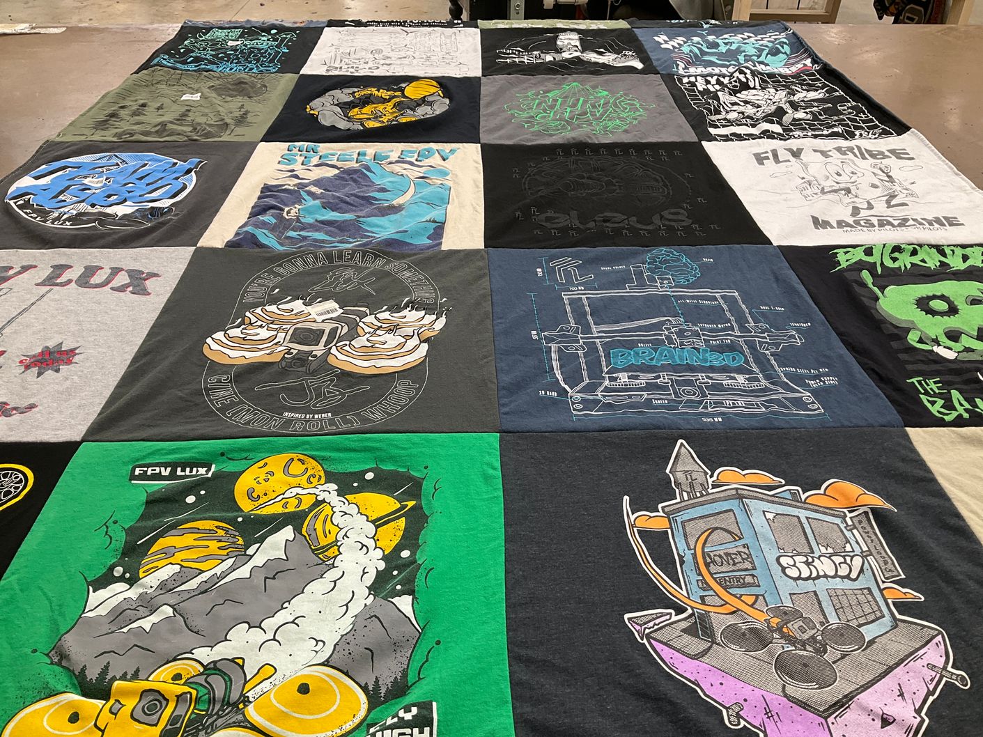 T-shirt quilt with drone flying, magazines themes by Jeffery from NY