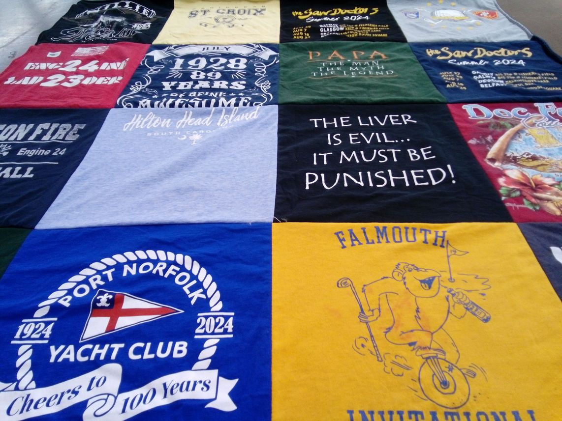 T-shirt quilt with yachting, golfing themes by Barbara from MA
