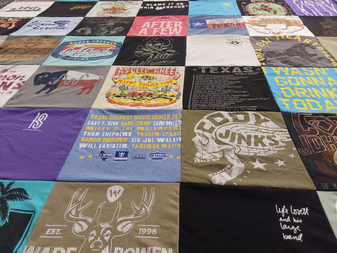 T-shirt quilt with country music, concerts themes by Pamela Kay from TX