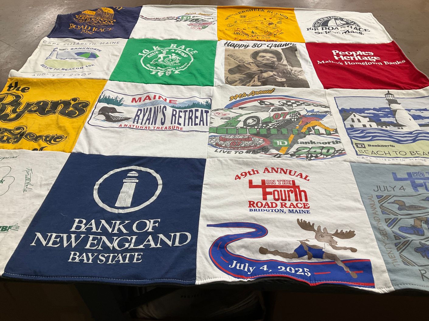 T-shirt quilt with running, community events themes by Rachel from ME