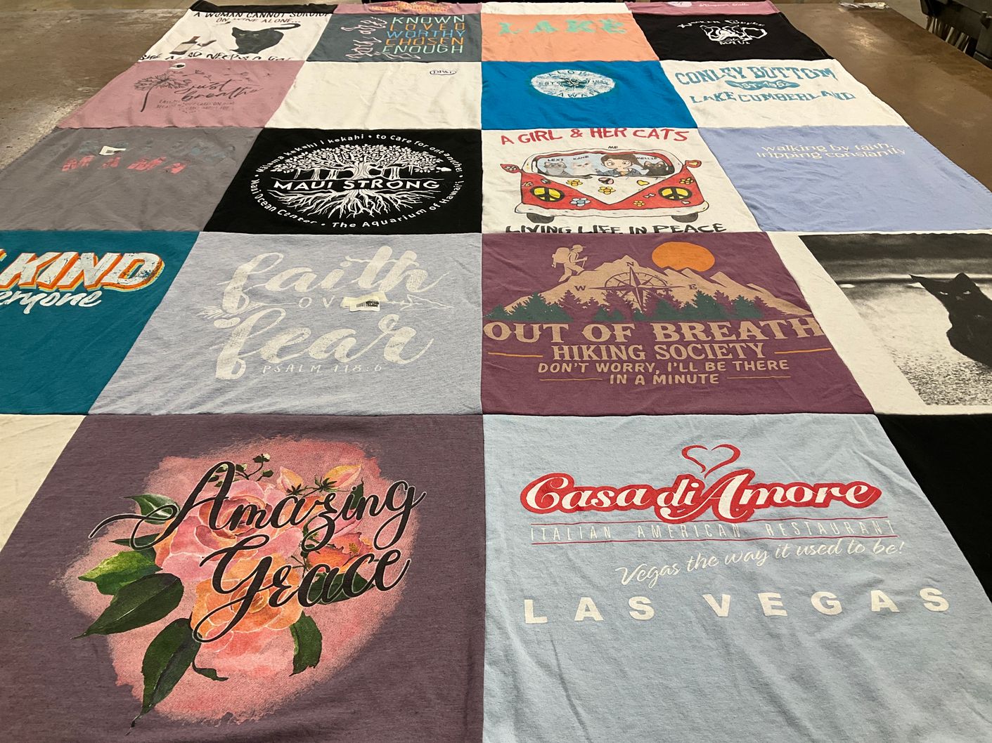 T-shirt quilt with hiking, cats themes by Kelly from OH