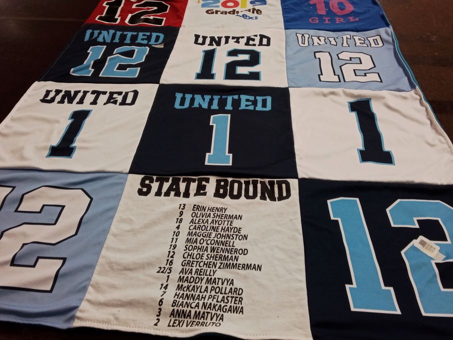 T-shirt quilt with sports themes by CARA from NY