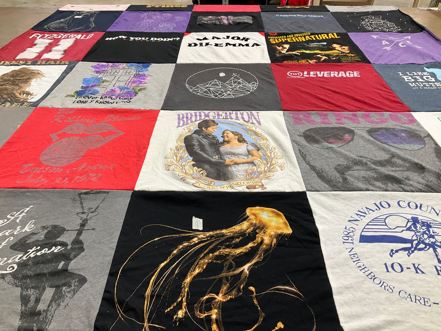 T-shirt quilt with tv shows, music themes by Erin from AZ
