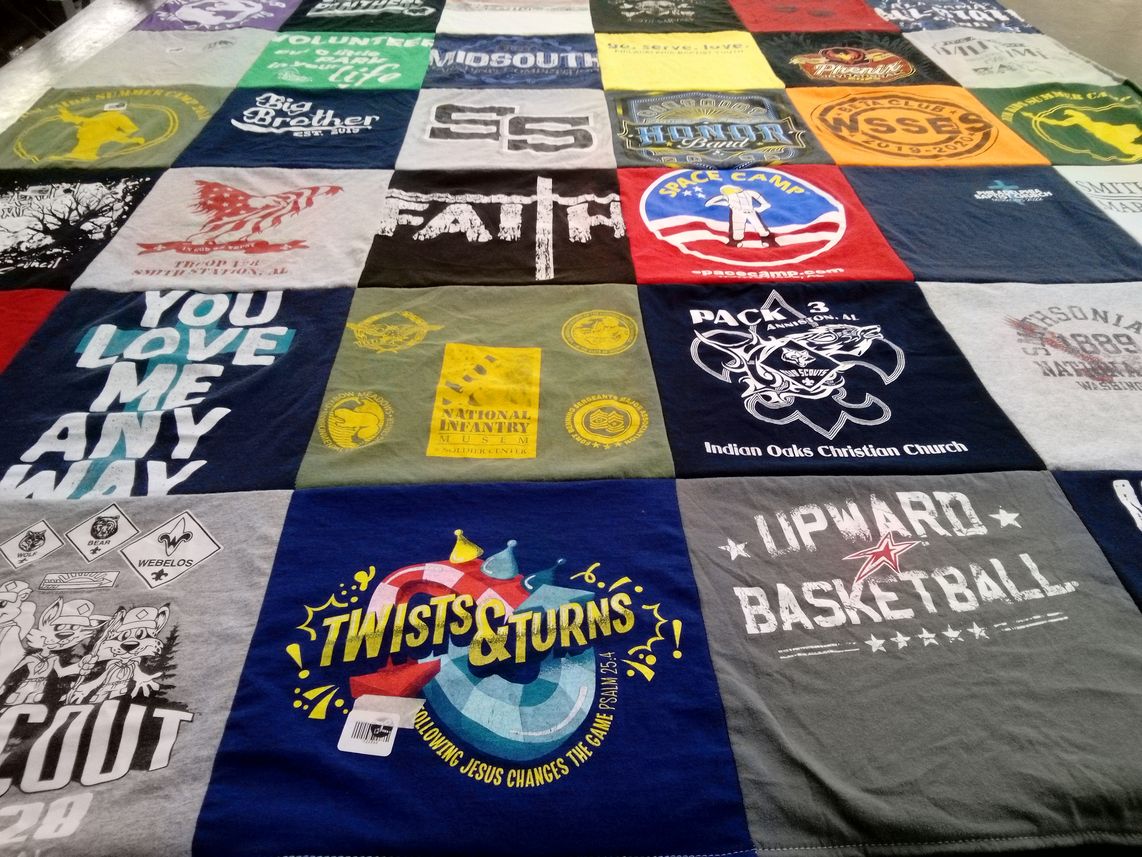 T-shirt quilt with sports, scouting themes by Audra from AL