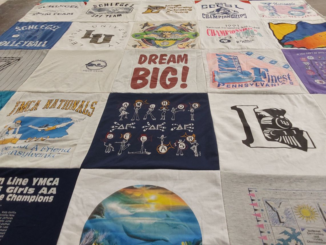 T-shirt quilt featuring schlegel swim team by Cheryl from NC