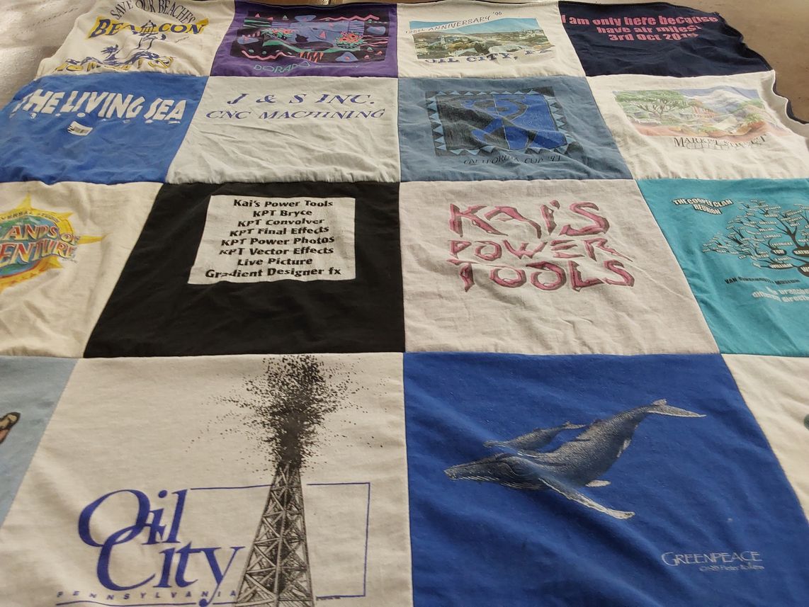 T-shirt quilt with ocean conservation, adventure themes by Sarah from CA
