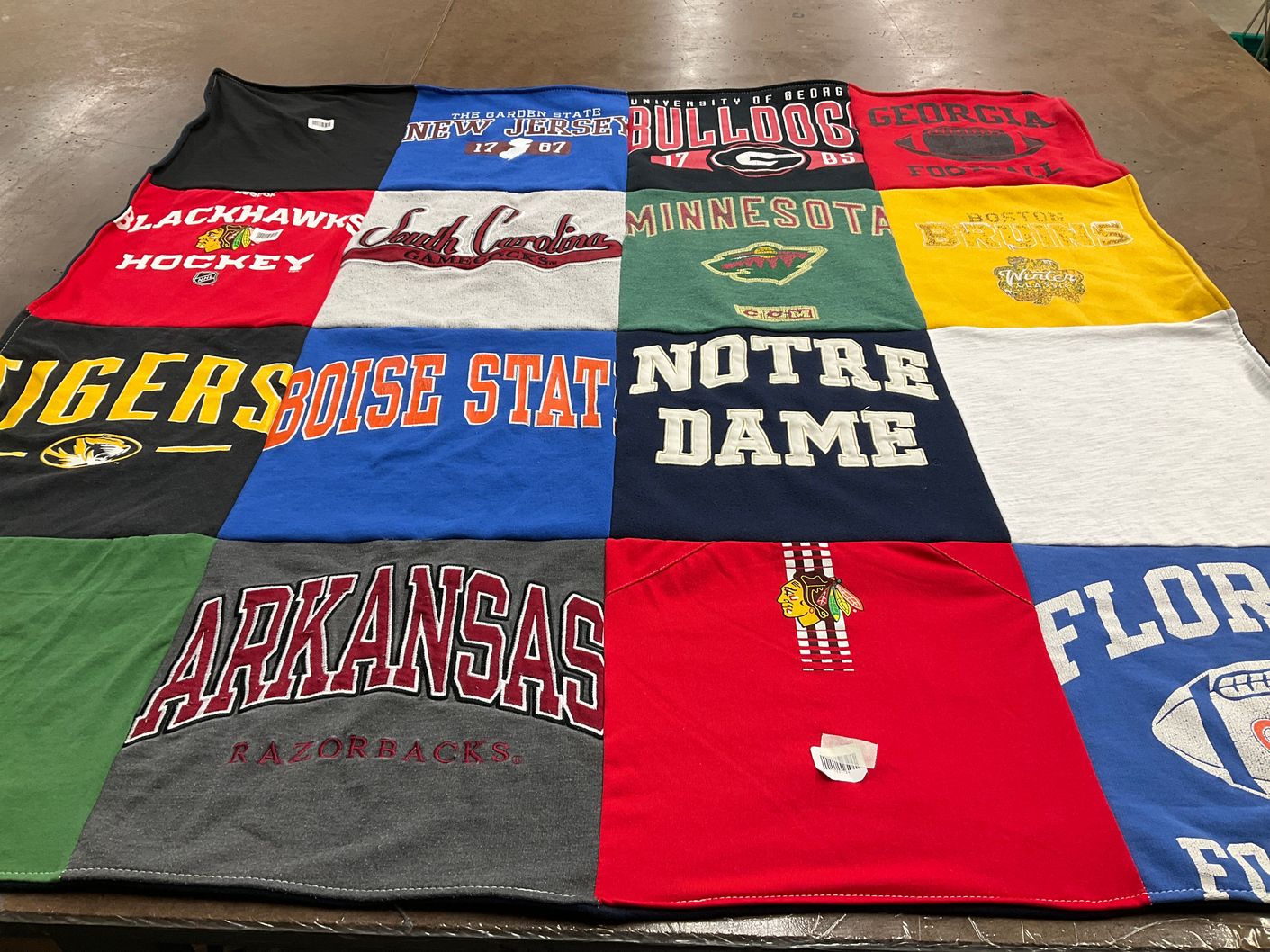 T-shirt quilt featuring florida gators, arkansas razorbacks by Erin from MA