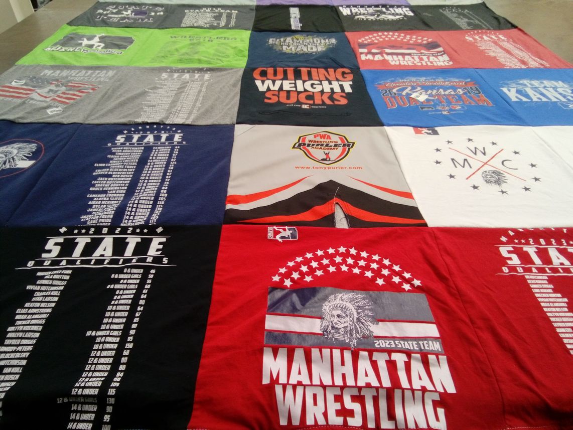 T-shirt quilt featuring manhattan wrestling by Michelle from KS