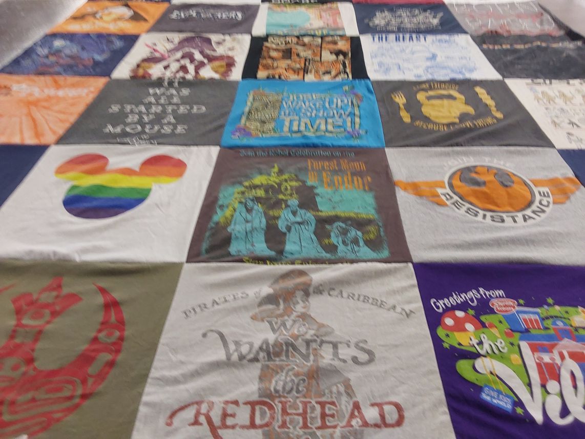 T-shirt quilt with disney, pirates themes by Sue from NJ