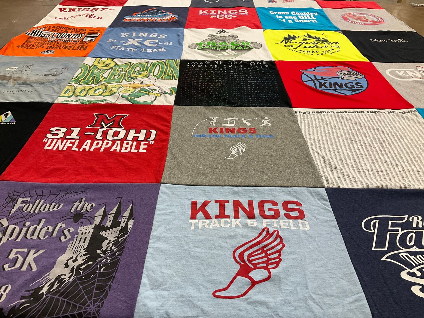 T-shirt quilt featuring kings track and field, kings cross country by Jill from OH