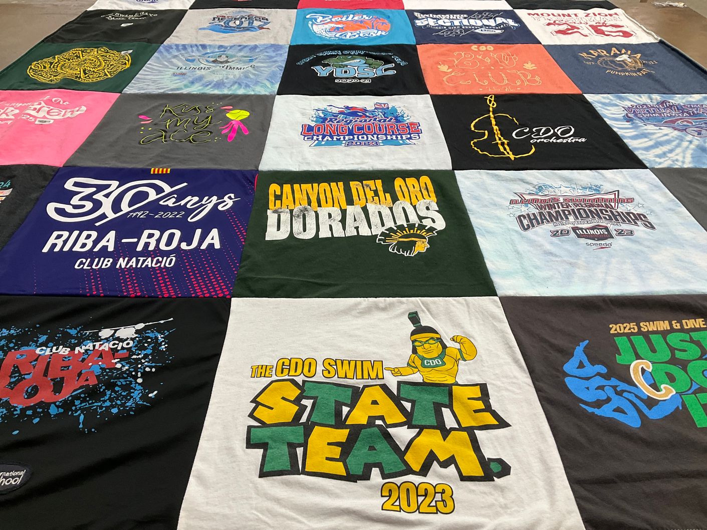 T-shirt quilt featuring cdo swim team by Amy from AZ
