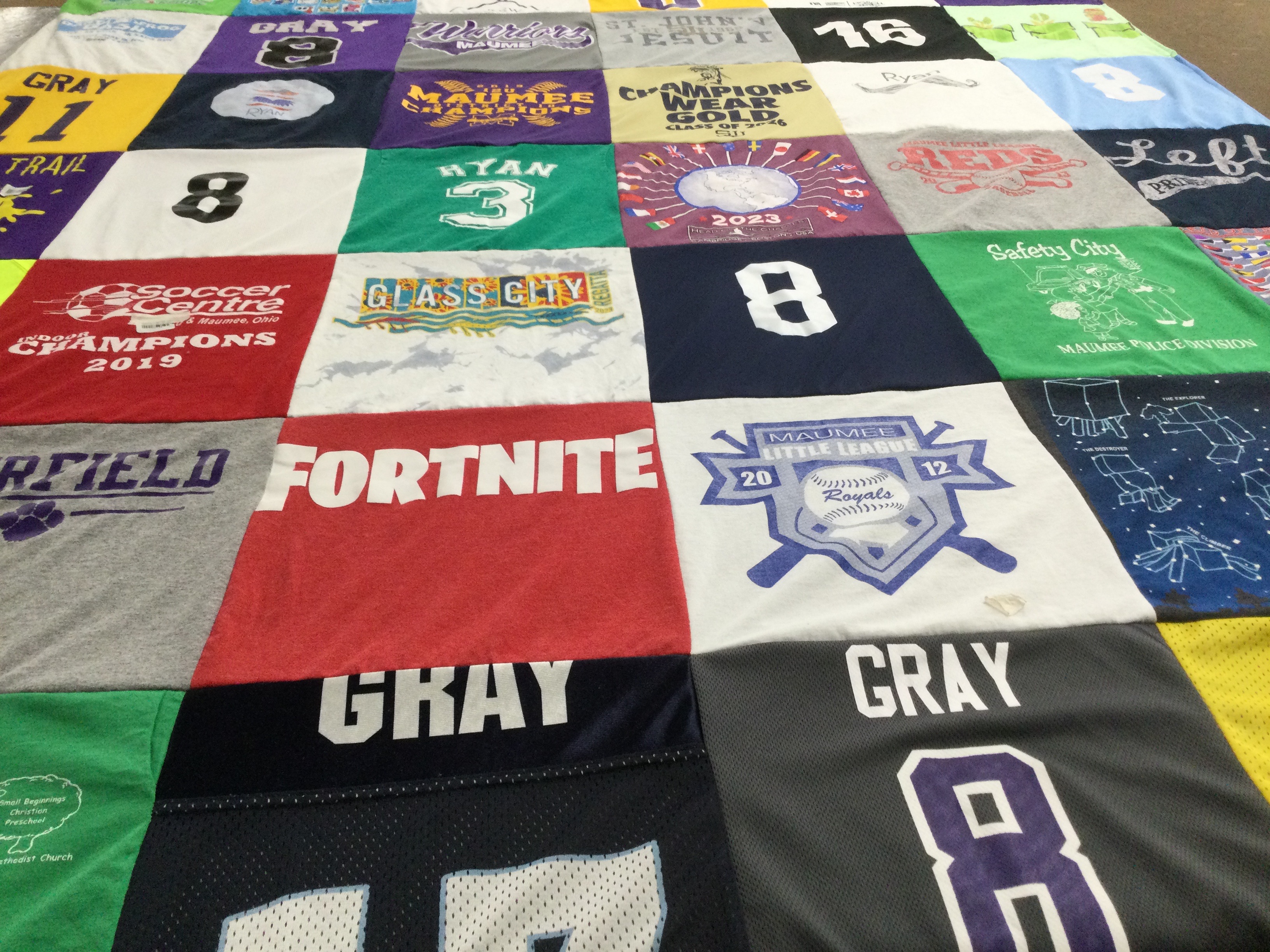T-shirt quilt with sports, video games themes by Hillary from OH