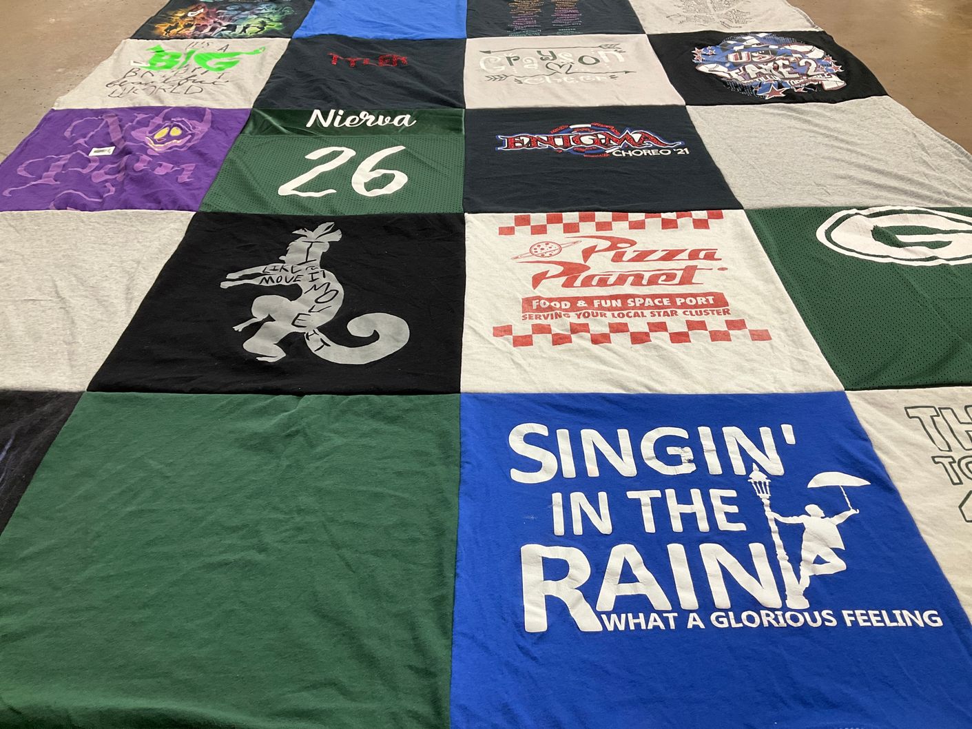 T-shirt quilt with theater, food themes by Caroline from VA