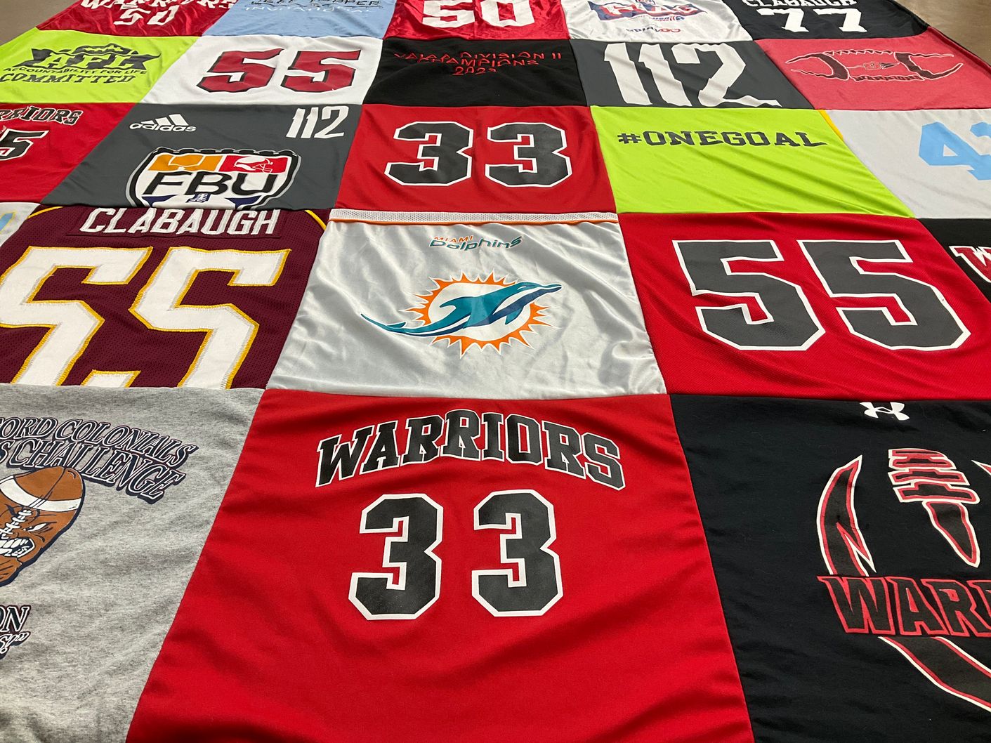 T-shirt quilt featuring warriors, dolphins by Nicole from PA