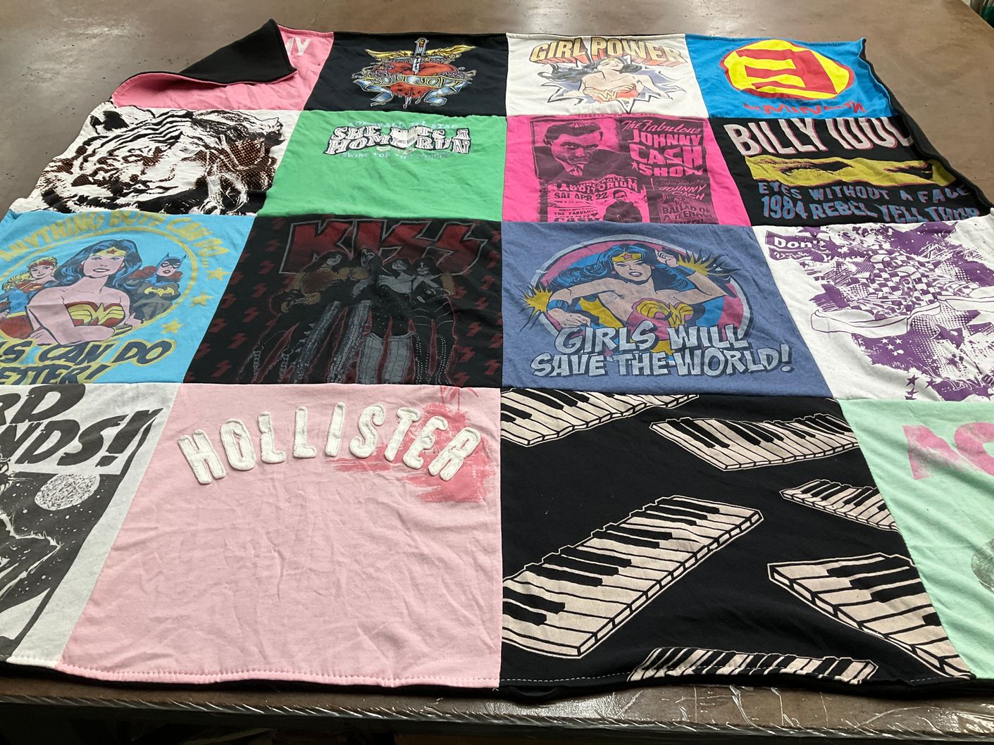 T-shirt quilt with music, superheroes themes by Lynette from CO