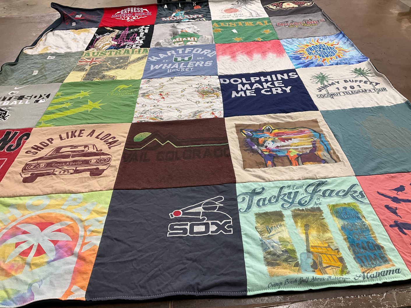T-shirt quilt with travel, sports themes by Lucy from DC