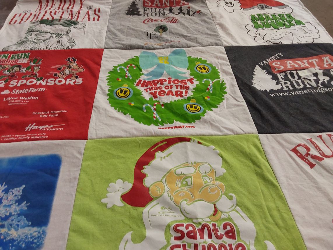 T-shirt quilt with holiday events, running themes by Gena from GA