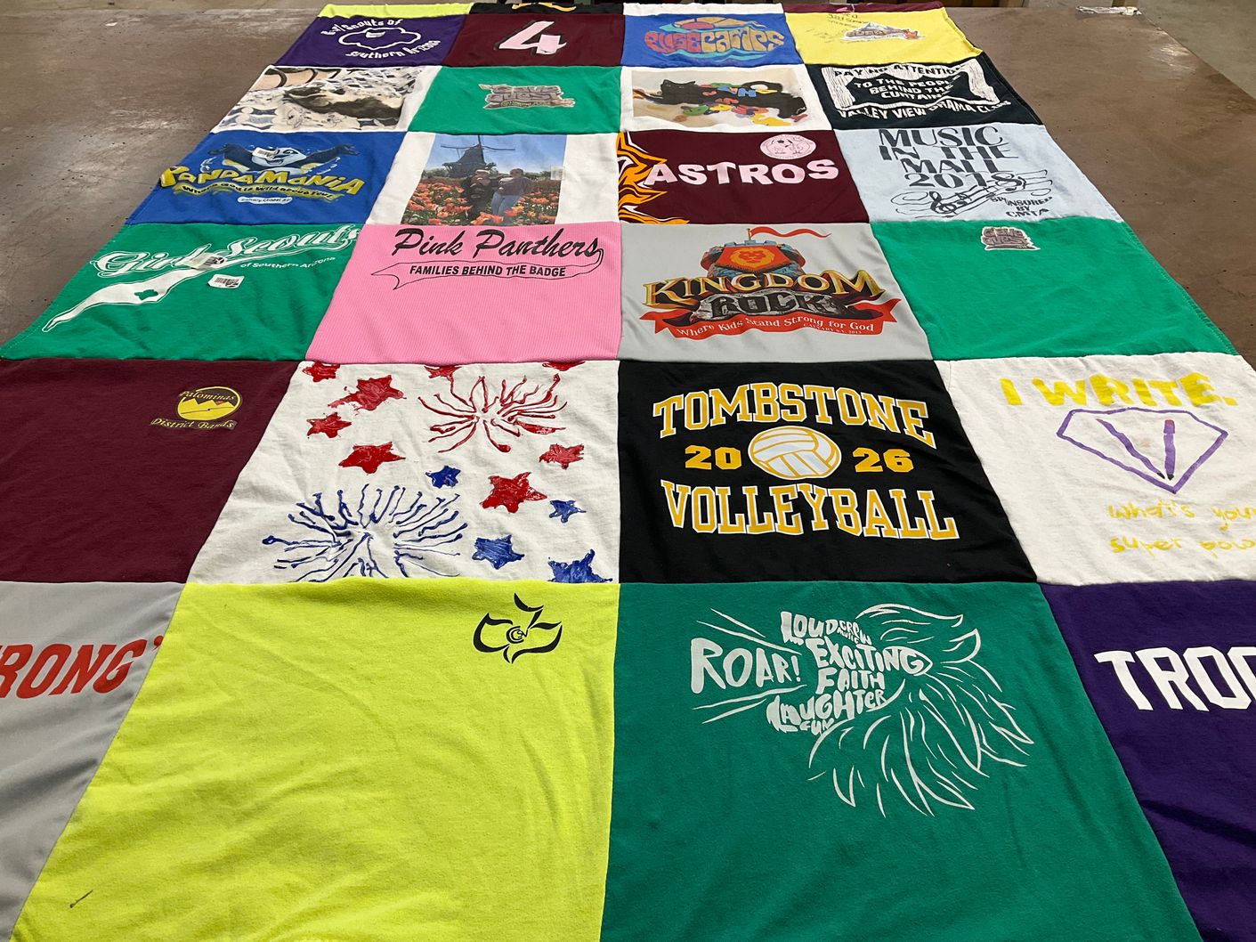 T-shirt quilt with sports, writing themes by Lisa from AZ