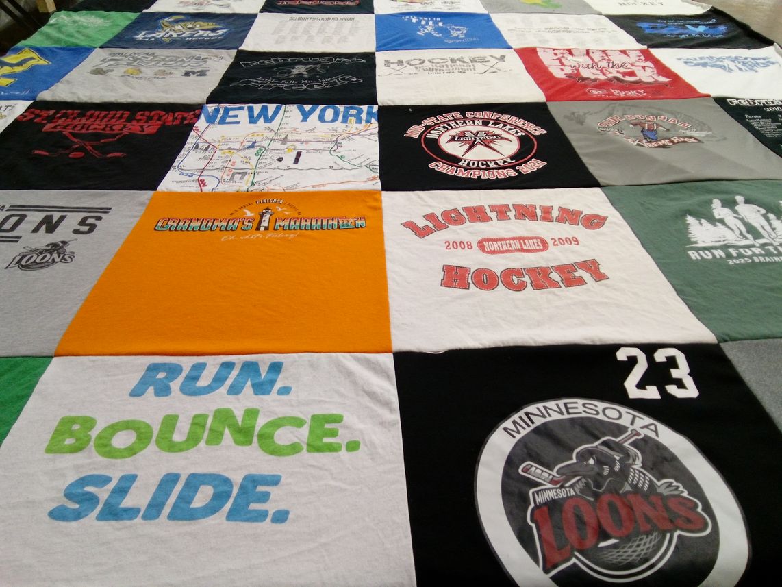 T-shirt quilt featuring minnesota loons, lightning hockey by Cindy from MN