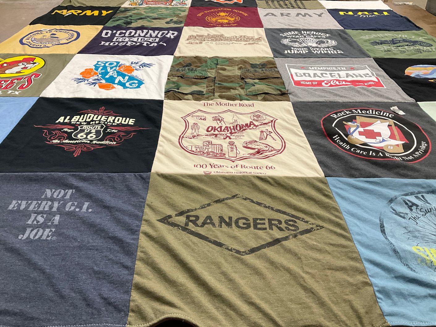 T-shirt quilt with travel, healthcare themes by Jill from CA