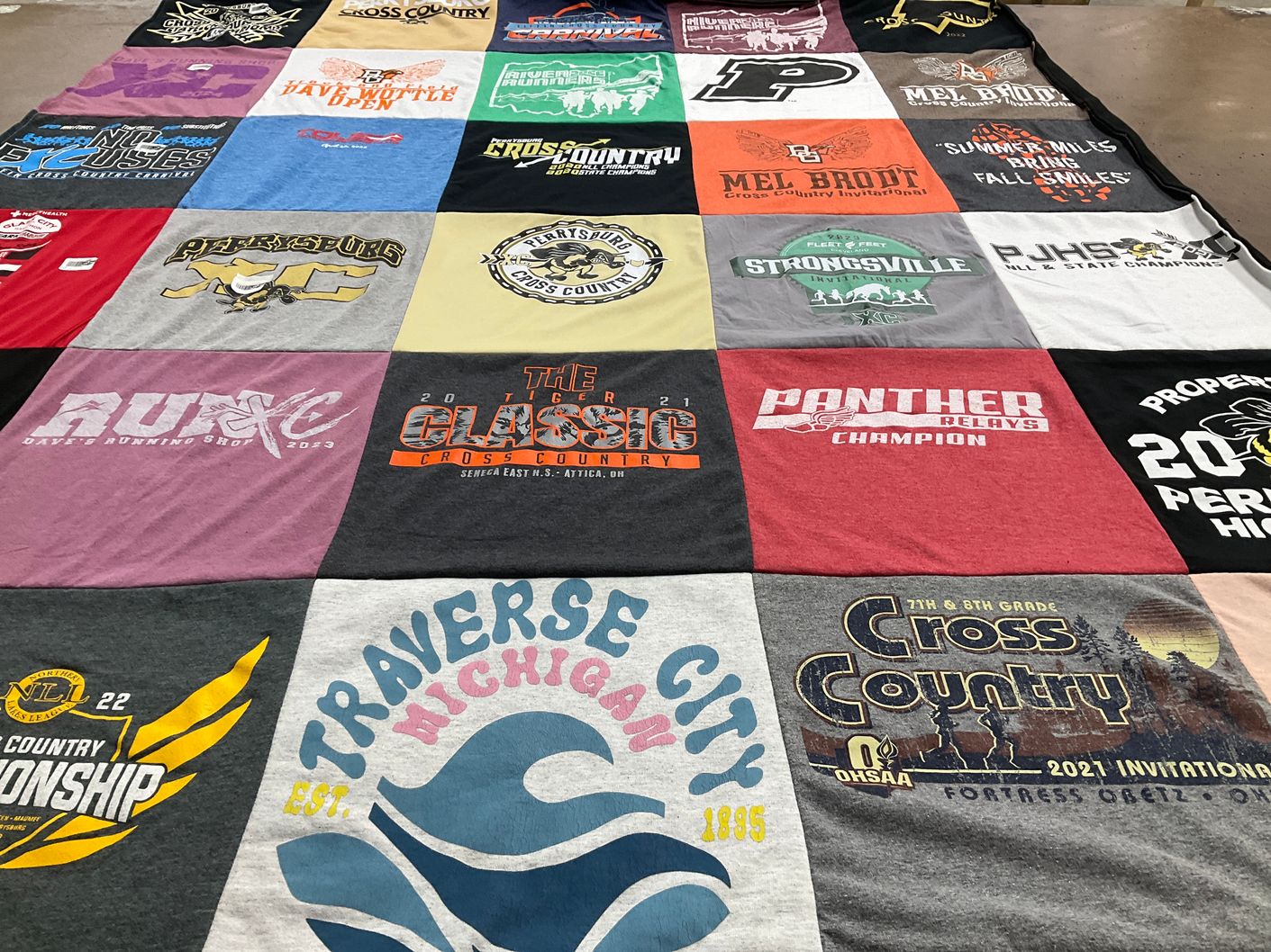 T-shirt quilt featuring mel brodt cross country, slippery hills cross country by Jennifer from OH