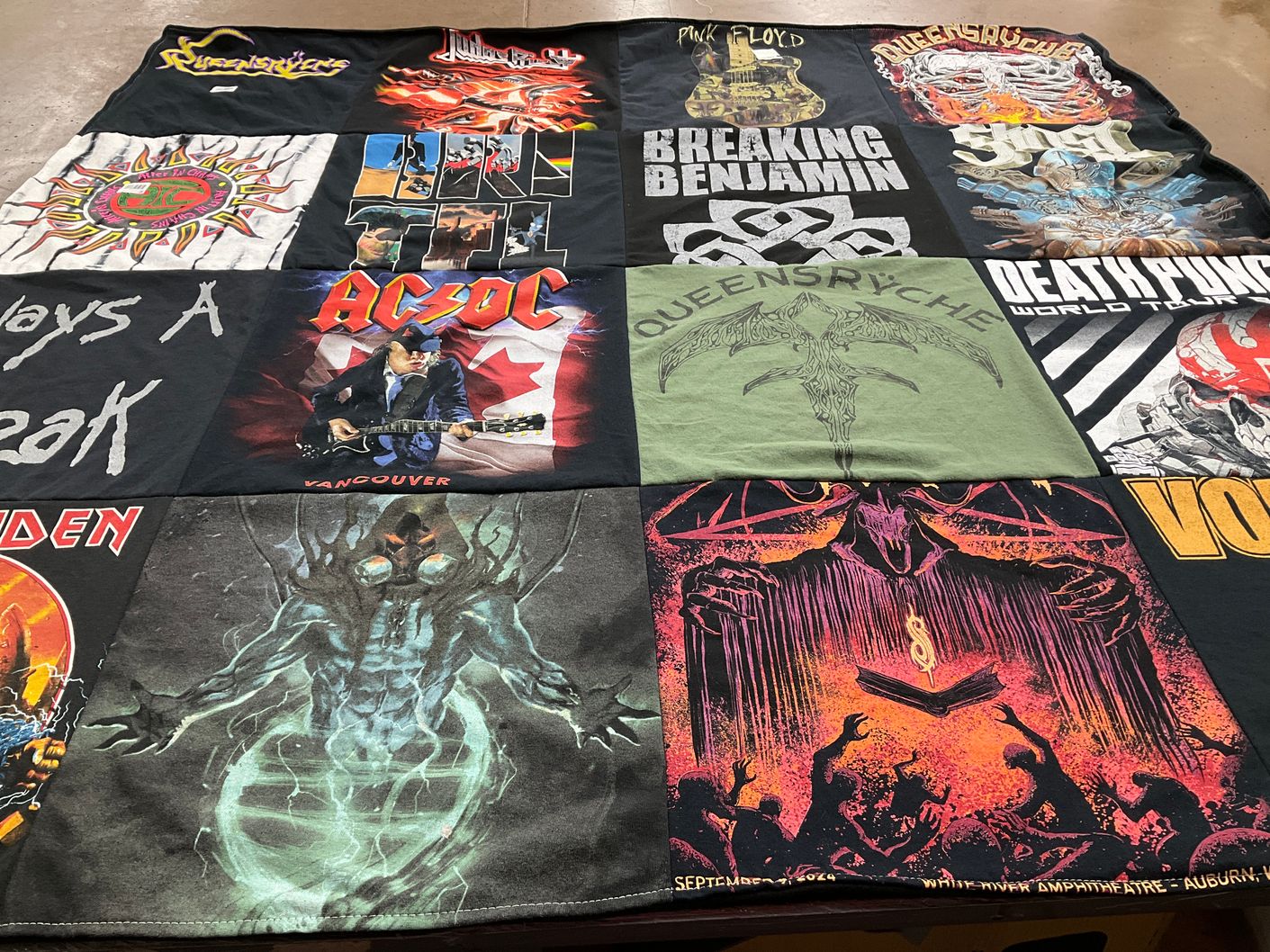 T-shirt quilt with rock, music themes by Julie from WA