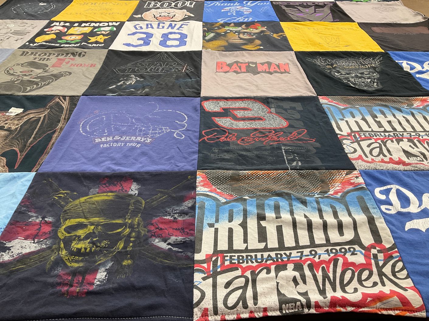 T-shirt quilt with sports, entertainment themes by s from CA
