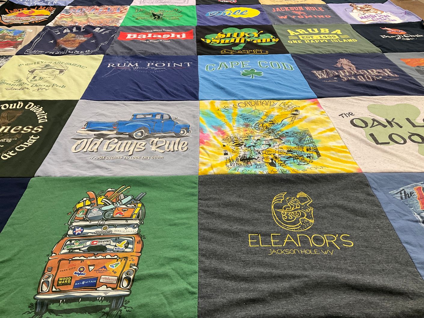 T-shirt quilt with travel, surfing themes by Theresa from MA