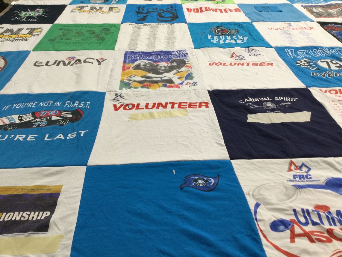 T-shirt quilt with robotics, volunteering themes by Kelly from CO
