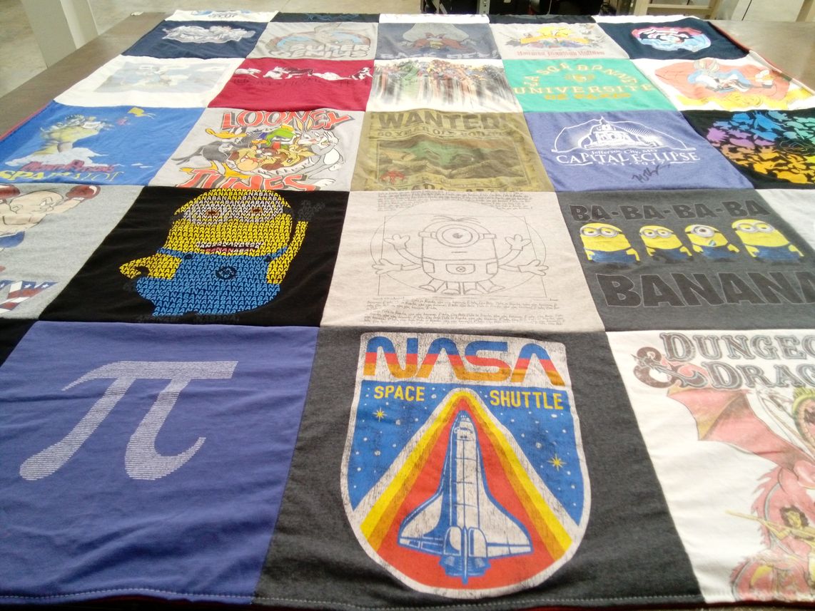 T-shirt quilt with cartoons, space themes by Dana from MI
